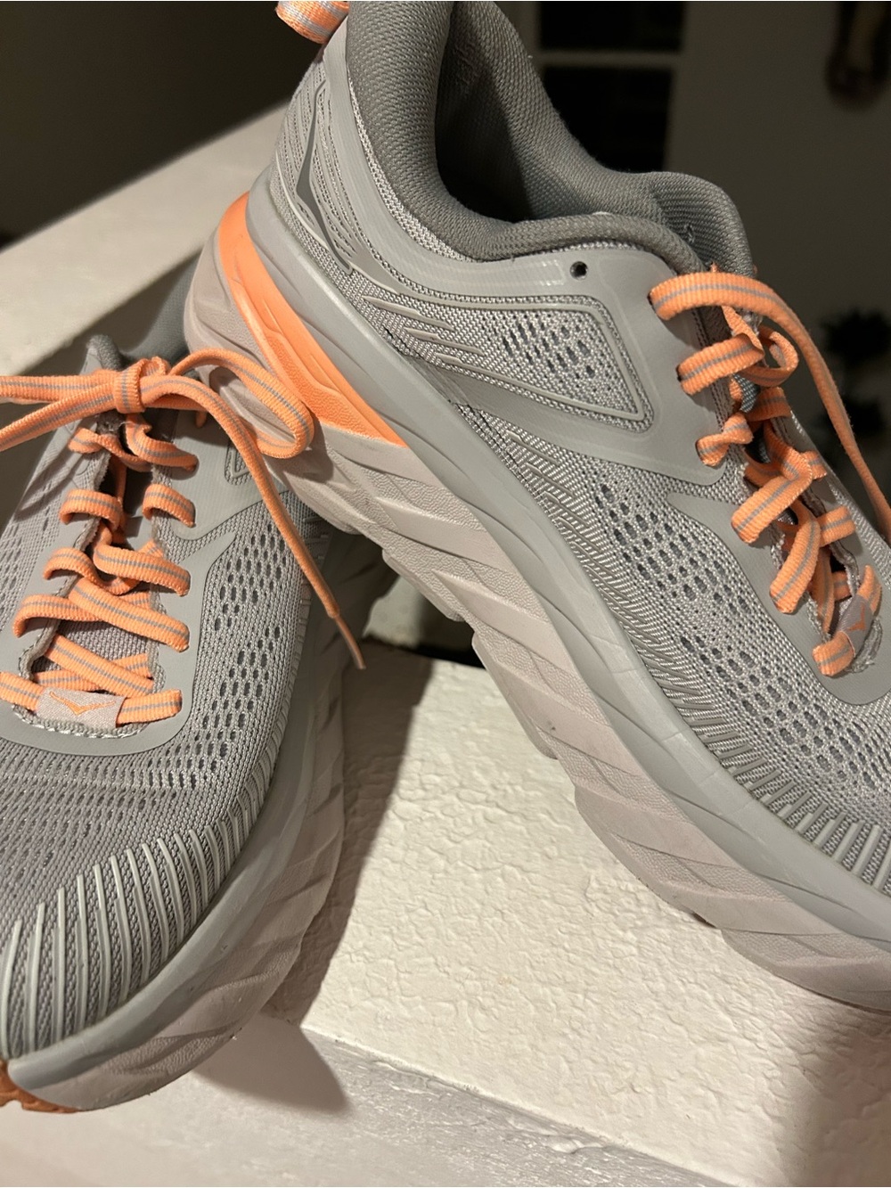 Hoka Women’s Bondi7s. Good pre-owned conditionin. US 7.5
with Peach Accents